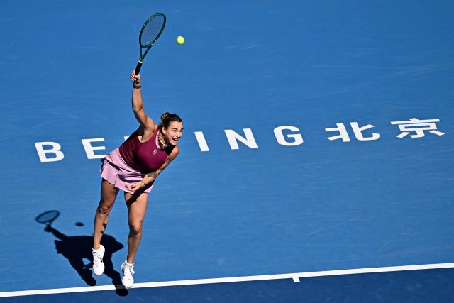 Belarus's Aryna Sabalenka serves to Czech Republic's Nikola Bartunkova during their women's singles match at the China Open tennis tournament in Beijing on October 4, 2026. (Photo by Pedro PARDO / AFP)