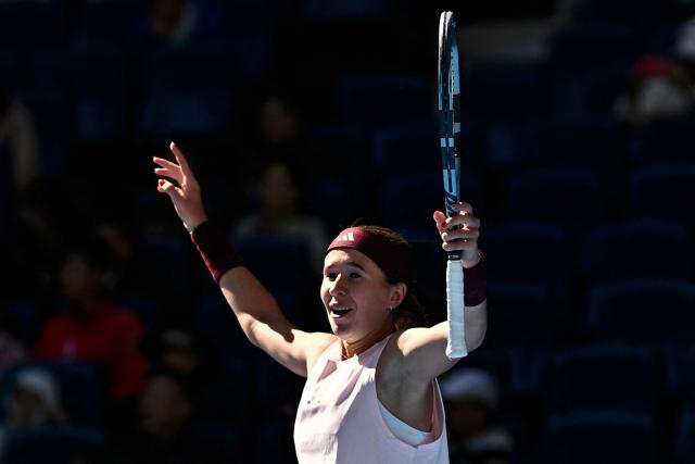Czech Republic's Nikola Bartunkova celebrates her victory over Belarus's Aryna Sabalenka during their women's singles match at the China Open tennis tournament in Beijing on October 4, 2026. (Photo by Pedro PARDO / AFP)
