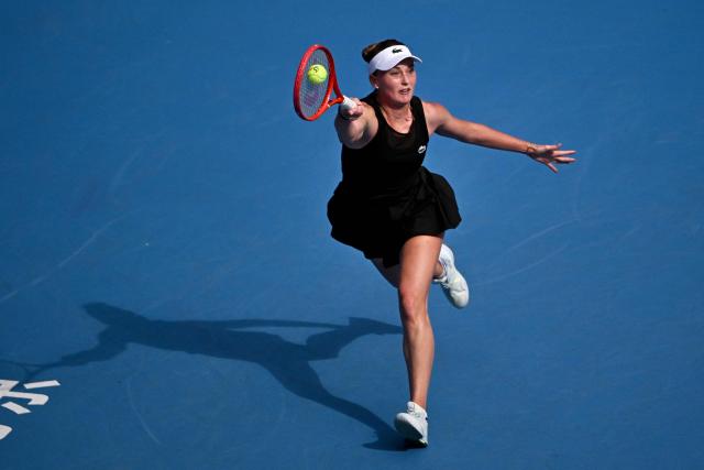 Uzbekistan's Polina Kudermetova hits a return to Russia's Mirra Andreeva during their women's singles match at the China Open tennis tournament in Beijing on October 4, 2026. (Photo by Pedro PARDO / AFP)