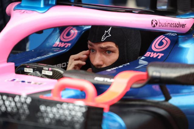 Alpine's French driver Pierre Gasly sits in his car ahead of the Formula One Bahrain Grand Prix in Sepang on October 4, 2026. (Photo by Annice Lyn / POOL / AFP)