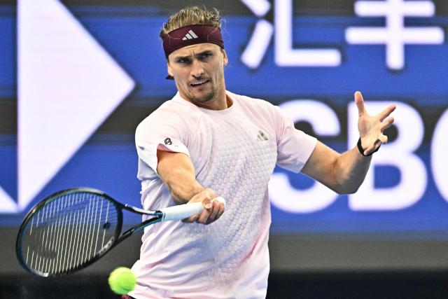 Germany’s Alexander Zverev hits a return to Serbia's Novak Djokovic during their men’s singles quarter-final at the China Open tennis tournament in Beijing on October 4, 2026. (Photo by Pedro PARDO / AFP)