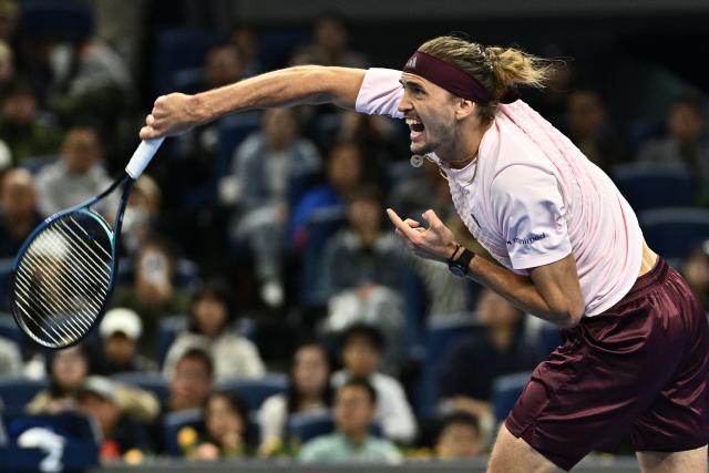Germany’s Alexander Zverev serves to Serbia's Novak Djokovic during their men’s singles quarter-final at the China Open tennis tournament in Beijing on October 4, 2026. (Photo by Pedro PARDO / AFP)
