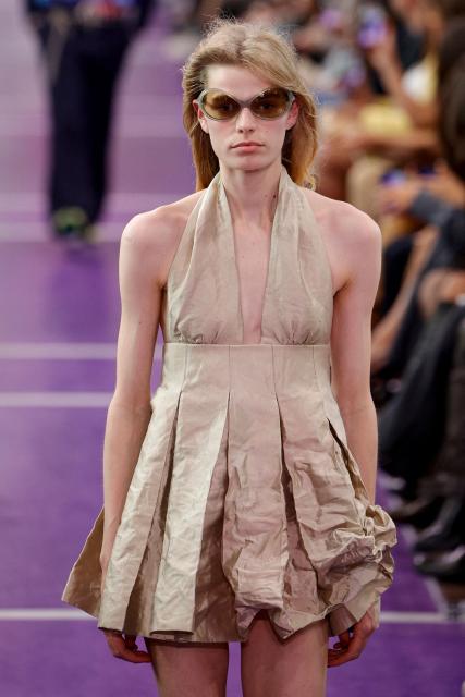 A model presents a creation for Miu Miu Women's Spring/Summer 2027 collection fashion show as part of the Paris Fashion Week, in Paris on October 4, 2026. (Photo by GEOFFROY VAN DER HASSELT / AFP)