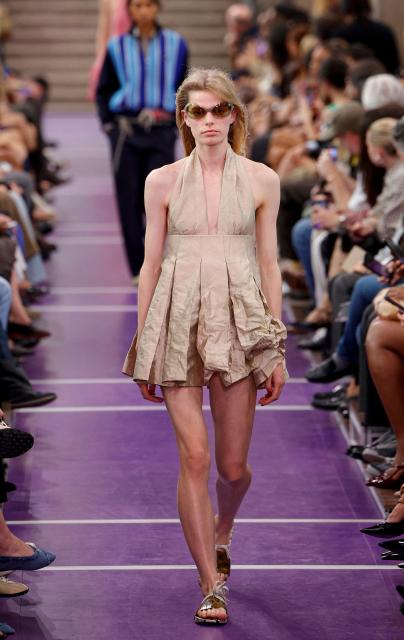 A model presents a creation for Miu Miu Women's Spring/Summer 2027 collection fashion show as part of the Paris Fashion Week, in Paris on October 4, 2026. (Photo by GEOFFROY VAN DER HASSELT / AFP)