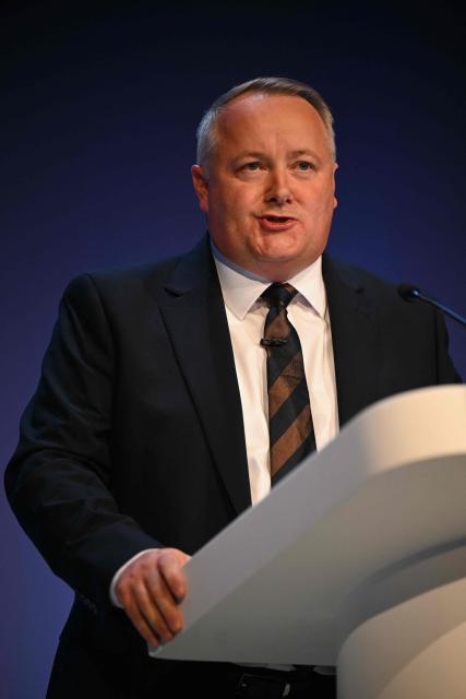 Leader of the Welsh Conservatives Darren Millar speaks in the main hall on the first day of the annual Conservative Party conference in Birmingham, central England, on October 4, 2026.  (Photo by Oli SCARFF / AFP)