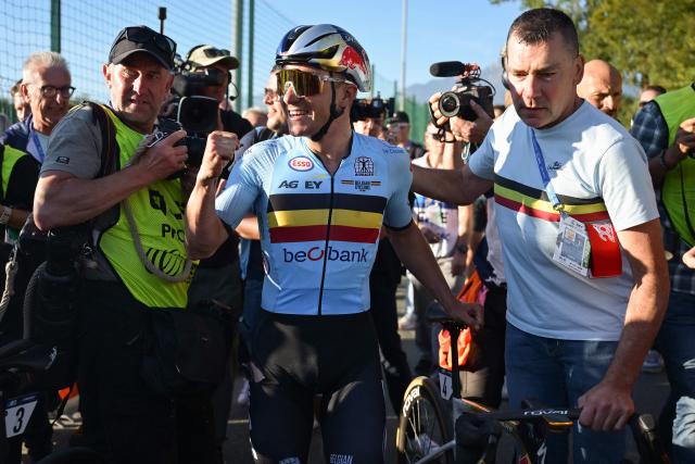 Belgium's rider Remco Evenepoel reacts after winning the men's elite road race of the UEC European Road Cycling Championships in Sencur, near Ljubljana, Slovenia, on October 4, 2026. (Photo by JURE MAKOVEC / AFP)