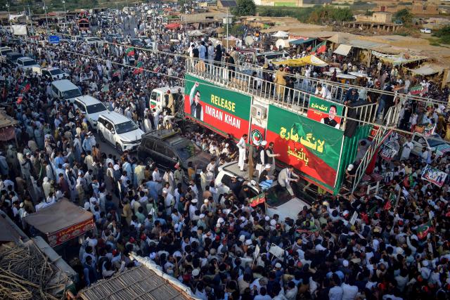 Supporters of jailed former prime minister Imran Khan's Pakistan Tehreek-e-Insaf (PTI) party take part in a long march in Lakki Marwat of Pakistan's Khyber Pakhtunkhwa province on October 4, 2026. A march protesting against the imprisonment of former Pakistani prime minister Imran Khan kicked off in northwest Pakistan on October 4 after talks to avoid the demonstration stalled. (Photo by Marwat AKBAR / AFP)