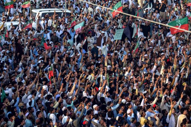 Supporters of jailed former prime minister Imran Khan's Pakistan Tehreek-e-Insaf (PTI) party take part in a long march in Lakki Marwat of Pakistan's Khyber Pakhtunkhwa province on October 4, 2026. A march protesting against the imprisonment of former Pakistani prime minister Imran Khan kicked off in northwest Pakistan on October 4 after talks to avoid the demonstration stalled. (Photo by Marwat AKBAR / AFP)