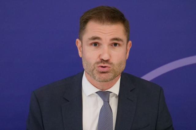 Public prosecutor Paul-Edouard Lallois delivers a speech during a press conference by the Belfort public prosecutor on the assault of a police officer by demonstrators during a high school students protest in Belfort on October 4, 2026. A high school student suspected of having taken part in the beating of a police officer in Belfort on October 2, on the sidelines of a high school protest, has filed a complaint for attempted murder, the lawyer for this teenager told AFP. The officer had tried to arrest him before being attacked. the student is one of the two minors, aged 17 and 15, who were arrested for the beating of a police officer in Belfort on October 2, and are being prosecuted for aggravated assault and not attempted murder, prosecutor Paul-Édouard Lallois told the press on October 4. (Photo by Sébastien SAUGUES / AFP)