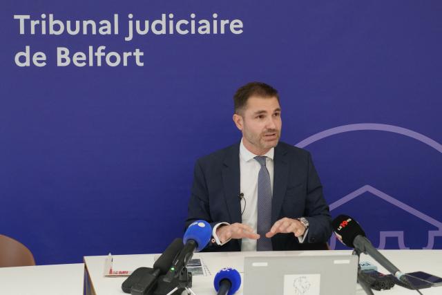 Public prosecutor Paul-Edouard Lallois delivers a speech during a press conference by the Belfort public prosecutor on the assault of a police officer by demonstrators during a high school students protest in Belfort on October 4, 2026. A high school student suspected of having taken part in the beating of a police officer in Belfort on October 2, on the sidelines of a high school protest, has filed a complaint for attempted murder, the lawyer for this teenager told AFP. The officer had tried to arrest him before being attacked. the student is one of the two minors, aged 17 and 15, who were arrested for the beating of a police officer in Belfort on October 2, and are being prosecuted for aggravated assault and not attempted murder, prosecutor Paul-Édouard Lallois told the press on October 4. (Photo by Sébastien SAUGUES / AFP)