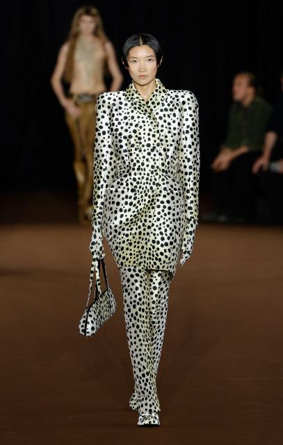 A model presents a creation for Mugler Women's Spring/Summer 2027 collection fashion show as part of the Paris Fashion Week, in Paris on October 4, 2026. (Photo by GEOFFROY VAN DER HASSELT / AFP)