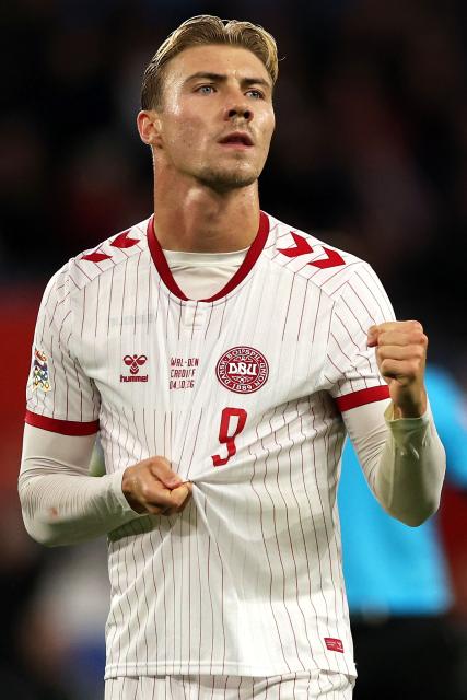 Denmark's striker #09 Rasmus Hojlund celebrates scoring the team's first goal during the UEFA Nations League, league A, group 4 football match between Wales and Denmark, at the Cardiff City Stadium in Cardiff, south Wales, on October 4, 2026. (Photo by Adrian DENNIS / AFP)