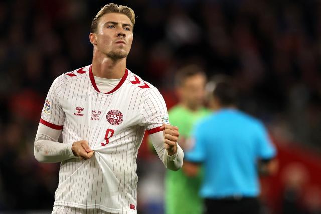 Denmark's striker #09 Rasmus Hojlund celebrates scoring the team's first goal during the UEFA Nations League, league A, group 4 football match between Wales and Denmark, at the Cardiff City Stadium in Cardiff, south Wales, on October 4, 2026. (Photo by Adrian DENNIS / AFP)