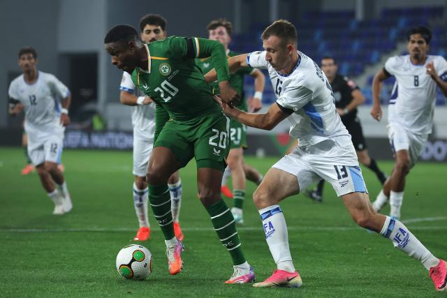 Republic of Ireland's forward #20 Chiedozie Ogbene (C) and Israel's defender #13 Nikita Stoinov (R) during the UEFA Nations League Group B3 football match between the Republic of Ireland and Israel at the TSC Arena in Backa Topola on October 4, 2026. (Photo by Pedja Milosavljevic / AFP)