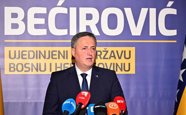 Bosnian Muslim left-wing politician Denis Becirovic addresses the media after winning a mandate as the Bosnian Muslim member of Bosnia's tripartite presidency in Sarajevo on October 4, 2026. The former president of Bosnia's Serb statelet, Milorad Dodik, said his party had retained power in the entity and its seat on the shared presidency, as preliminary results showed a drop in turnout for Bosnia's general elections. (Photo by ELVIS BARUKCIC / AFP)