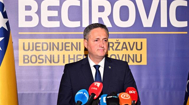 Bosnian Muslim left-wing politician Denis Becirovic addresses the media after winning a mandate as the Bosnian Muslim member of Bosnia's tripartite presidency in Sarajevo on October 4, 2026. The former president of Bosnia's Serb statelet, Milorad Dodik, said his party had retained power in the entity and its seat on the shared presidency, as preliminary results showed a drop in turnout for Bosnia's general elections. (Photo by ELVIS BARUKCIC / AFP)