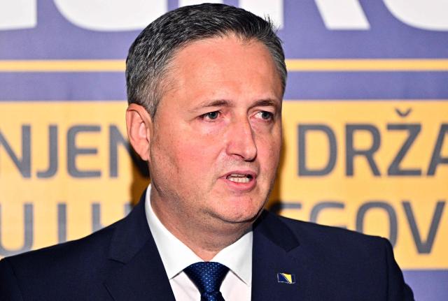 Bosnian Muslim left-wing politician Denis Becirovic addresses the media after winning a mandate as the Bosnian Muslim member of Bosnia's tripartite presidency in Sarajevo on October 4, 2026. The former president of Bosnia's Serb statelet, Milorad Dodik, said his party had retained power in the entity and its seat on the shared presidency, as preliminary results showed a drop in turnout for Bosnia's general elections. (Photo by ELVIS BARUKCIC / AFP)
