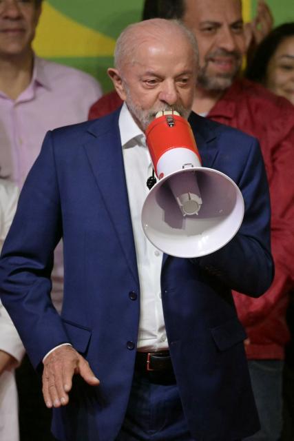 Brazil's President and re-election candidate for the Workers' Party (PT) Luiz Inacio Lula da Silva speaks to supporters following the partial results of the presidential election in Sao Paulo, Brazil on October 4, 2026. Brazilian senator Flavio Bolsonaro, son of the far-right former leader Jair Bolsonaro, finished ahead of President Luiz Inacio Lula da Silva in the election on October 4, 2026, which will go to a run-off in three weeks. (Photo by NELSON ALMEIDA / AFP)