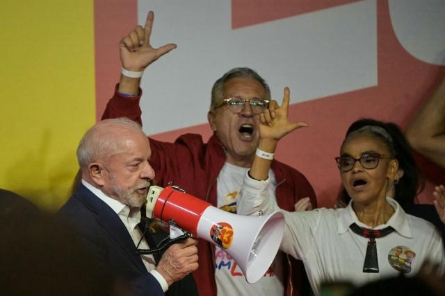 Brazil's President and re-election candidate for the Workers' Party (PT) Luiz Inacio Lula da Silva speaks to supporters following the partial results of the presidential election in Sao Paulo, Brazil on October 4, 2026. Brazilian senator Flavio Bolsonaro, son of the far-right former leader Jair Bolsonaro, finished ahead of President Luiz Inacio Lula da Silva in the election on October 4, 2026, which will go to a run-off in three weeks. (Photo by NELSON ALMEIDA / AFP)