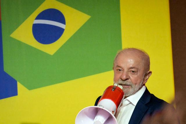 Brazil's President and re-election candidate for the Workers' Party (PT) Luiz Inacio Lula da Silva speaks to supporters following the partial results of the presidential election in Sao Paulo, Brazil on October 4, 2026. Brazilian senator Flavio Bolsonaro, son of the far-right former leader Jair Bolsonaro, finished ahead of President Luiz Inacio Lula da Silva in the election on October 4, 2026, which will go to a run-off in three weeks. (Photo by NELSON ALMEIDA / AFP)