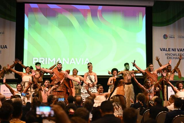 Traditional dancers perform at an opening ceremony of the Pacific Pre-COP31 Summit in Nadi on October 5, 2026. (Photo by Saeed KHAN / AFP)