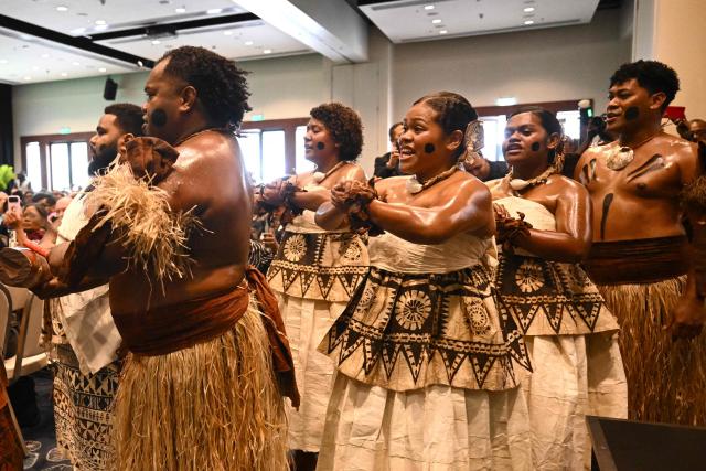 Traditional dancers perform at an opening ceremony of the Pacific Pre-COP31 Summit in Nadi on October 5, 2026. (Photo by Saeed KHAN / AFP)