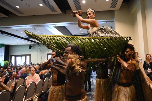Traditional dancers perform at an opening ceremony of the Pacific Pre-COP31 Summit in Nadi on October 5, 2026. (Photo by Saeed KHAN / AFP)