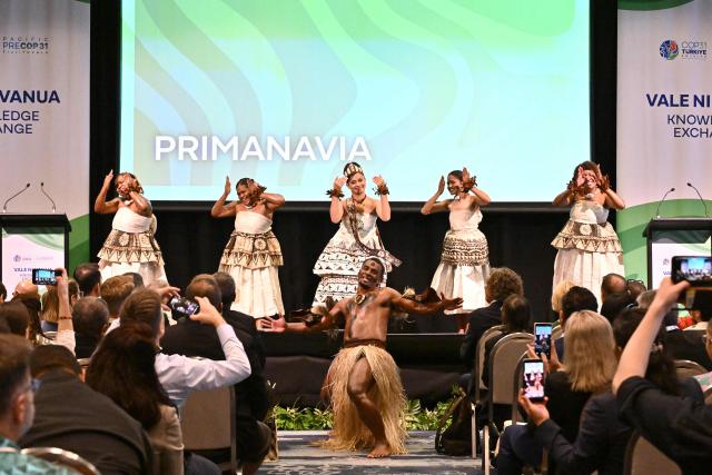 Traditional dancers perform at an opening ceremony of the Pacific Pre-COP31 Summit in Nadi on October 5, 2026. (Photo by Saeed KHAN / AFP)
