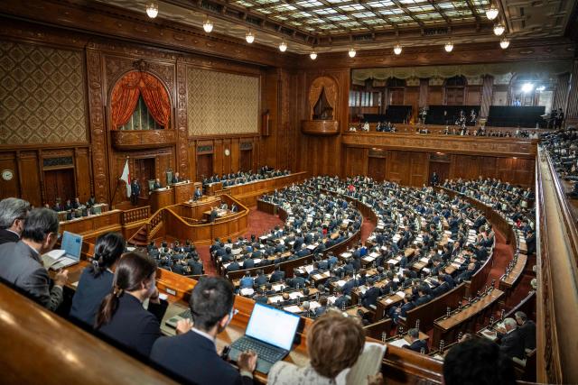 Japan's Prime Minister Sanae Takaichi delivers a speech during a plenary session of the House of Representatives at the National Diet in Tokyo on October 5, 2026. (Photo by Yuichi YAMAZAKI / AFP)