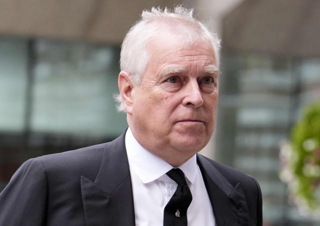 (FILES) Britain's Prince Andrew, Duke of York arrives to attend a Requiem Mass, a Catholic funeral service, for the late Katharine, Duchess of Kent, at Westminster Cathedral in London on September 16, 2025. Britain's disgraced former prince, Andrew Mountbatten-Windsor, has launched a High Court challenge "to quash search warrants" obtained by police ahead of his arrest earlier this year, the UK judiciary confirmed Monday. (Photo by Jordan Pettitt / POOL / AFP)