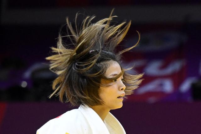 Japan's Uta Abe reacts after defeating Brazil's Larissa Pimenta in the women's under 52 kg round of 32 at the World Judo Championships in Baku on October 5, 2026. (Photo by Alexander NEMENOV / AFP)