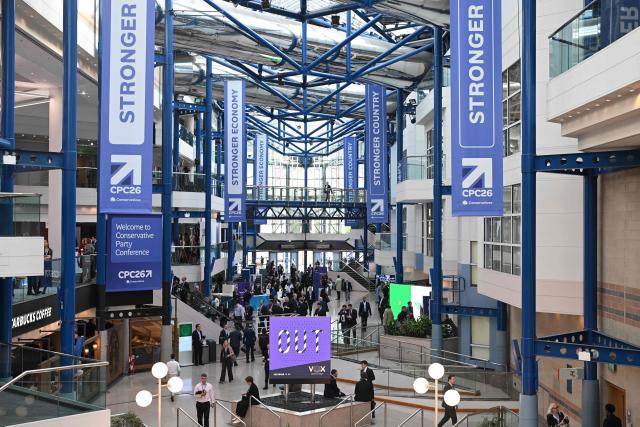 Delegates attend day two of the annual Conservative Party conference at the International Conference Centre in Birmingham, central England, on October 5, 2026.  (Photo by Oli SCARFF / AFP)