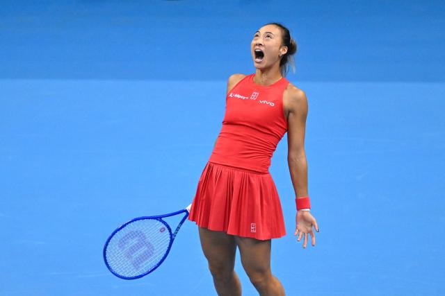 China’s Zheng Qinwen reacts after defeating Czech Republic’s Marie Bouzkova in their women’s singles match at the China Open tennis tournament in Beijing on October 5, 2026. (Photo by Greg Baker / AFP)
