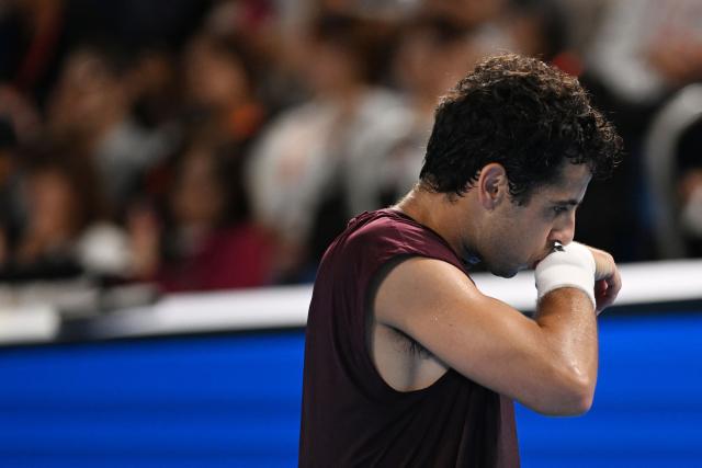 Spain's Jaume Munar reacts as he plays against compatriot Carlos Alcaraz during their men's singles semi-final tennis match at the ATP Tour Japan Open Tennis Championships at the Ariake Tennis Forest Park in Tokyo on October 5, 2026. (Photo by Rie KIKUCHI / AFP)