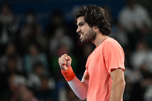 Spain's Carlos Alcaraz celebrates his victory against compatriot Jaume Munar in their men's singles semi-final tennis match at the ATP Tour Japan Open Tennis Championships at the Ariake Tennis Forest Park in Tokyo on October 5, 2026. (Photo by Rie KIKUCHI / AFP)