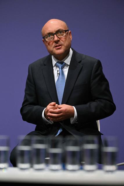 Britain's main opposition Conservative Party Shadow Chancellor of the Exchequer Andrew Griffith gestures on stage on day two of the annual Conservative Party conference in Birmingham, central England, on October 5, 2026.  (Photo by Oli SCARFF / AFP)