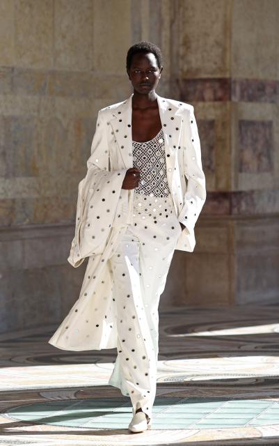 Model Nyaduola Gabriel presents a creation for Gabriela Hearst Women's Spring/Summer 2027 collection fashion show as part of the Paris Fashion Week, in Paris on October 5, 2026. (Photo by SIMON WOHLFAHRT / AFP)