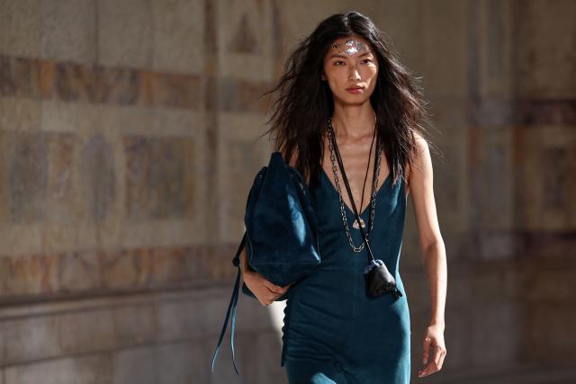 Chinese model Xinyue Guo presents a creation for Gabriela Hearst Women's Spring/Summer 2027 collection fashion show as part of the Paris Fashion Week, in Paris on October 5, 2026. (Photo by SIMON WOHLFAHRT / AFP)