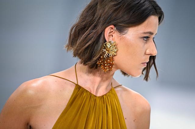 Swiss model Vivienne Rohner presents a creation for Zimmermann Women's Spring/Summer 2027 collection fashion show as part of the Paris Fashion Week, in Paris on October 5, 2026. (Photo by JULIEN DE ROSA / AFP)
