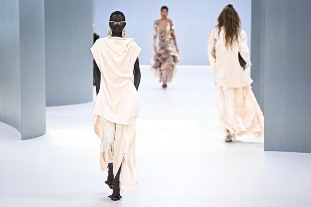 A model presents a creation for Zimmermann Women's Spring/Summer 2027 collection fashion show as part of the Paris Fashion Week, in Paris on October 5, 2026. (Photo by JULIEN DE ROSA / AFP)