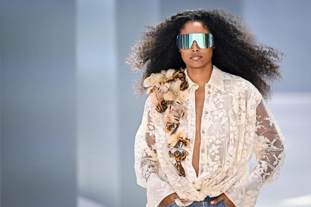 A model presents a creation for Zimmermann Women's Spring/Summer 2027 collection fashion show as part of the Paris Fashion Week, in Paris on October 5, 2026. (Photo by JULIEN DE ROSA / AFP)