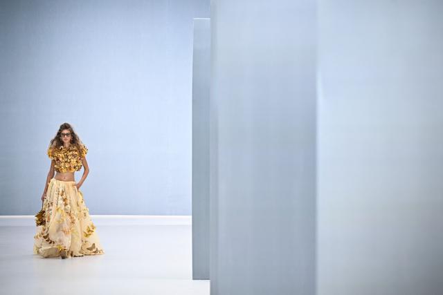 A model presents a creation for Zimmermann Women's Spring/Summer 2027 collection fashion show as part of the Paris Fashion Week, in Paris on October 5, 2026. (Photo by JULIEN DE ROSA / AFP)