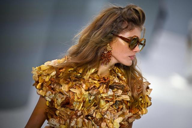 A model presents a creation for Zimmermann Women's Spring/Summer 2027 collection fashion show as part of the Paris Fashion Week, in Paris on October 5, 2026. (Photo by JULIEN DE ROSA / AFP)