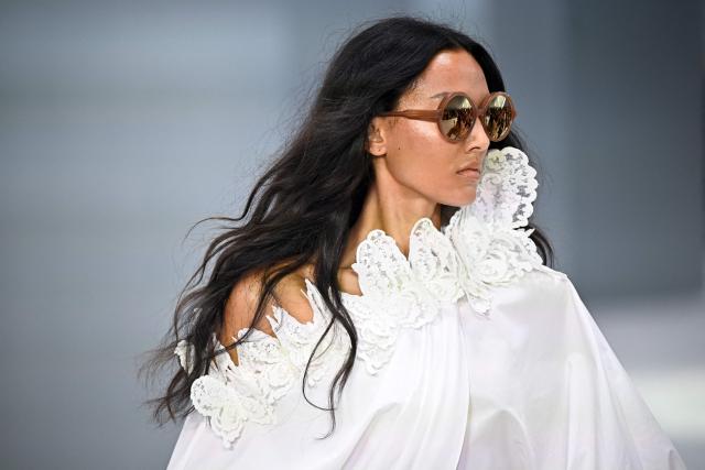 A model presents a creation for Zimmermann Women's Spring/Summer 2027 collection fashion show as part of the Paris Fashion Week, in Paris on October 5, 2026. (Photo by JULIEN DE ROSA / AFP)