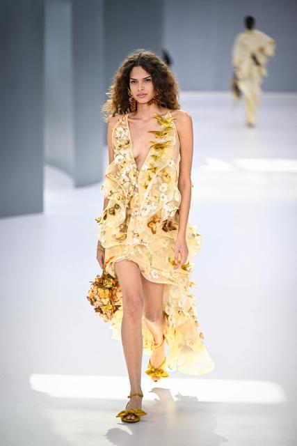 A model presents a creation for Zimmermann Women's Spring/Summer 2027 collection fashion show as part of the Paris Fashion Week, in Paris on October 5, 2026. (Photo by JULIEN DE ROSA / AFP)