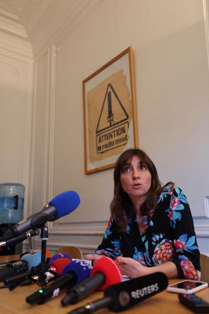 Lawyer Elsa Marcel gives a press conference at her office on October 5, 2026, on behalf of the family of 14-year-old high school student Eden, who suffered a facial injury during a high school student protest in Saint-Ouen-l'Aumone (Val-d'Oise), after the family announced a formal complaint. The complaint cites alleged "attempted intentional homicide" and alleged "intentional violence with a weapon committed by a person holding public authority against a minor under the age of 15", after Eden suffered a double jaw fracture and broken teeth on September 28 when a police officer fired a projectile at his face during a blockade at his school. (Photo by Mehdi FEDOUACH / AFP)
