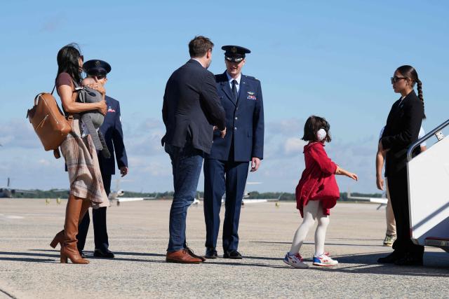 US Vice President JD Vance and his wife Usha Vance (L) and their family board Air Force Two at Joint Base Andrews in Maryland, October 5, 2026. Vance is travelling to attend a campaign rally ahead of the midterm elections, in Fairbanks, Alaska. (Photo by Jacquelyn Martin / POOL / AFP)