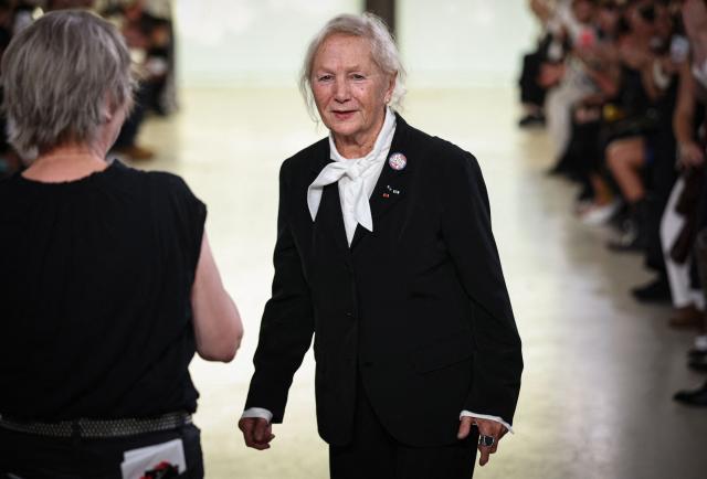 French designer Agnes Trouble known as Agnes b. aknowledges the audience at the end of the Agnes b. Women's Spring/Summer 2027 collection fashion show as part of the Paris Fashion Week, in Paris on October 5, 2026. (Photo by SIMON WOHLFAHRT / AFP)