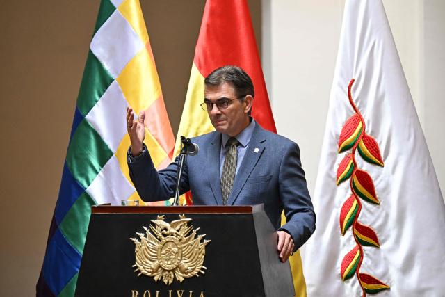 Bolivia's President Rodrigo Paz speaks during a ceremony recognizing Jose Armando Urioste as the country's interim attorney general at the Government Palace in La Paz on October 5, 2026. The Bolivian Congress suspended the attorney general, who was detained after being accused by the United States of alleged links to drug trafficking, and appointed an interim replacement on October 3 following a lengthy emergency session. Roger Mariaca, who had headed the Public Prosecutor's Office from 2024 until his arrest on September 30, will be temporarily replaced by Jose Armando Urioste. (Photo by Aizar RALDES / AFP)