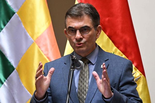 Bolivia's President Rodrigo Paz speaks during a ceremony recognizing Jose Armando Urioste as the country's interim attorney general at the Government Palace in La Paz on October 5, 2026. The Bolivian Congress suspended the attorney general, who was detained after being accused by the United States of alleged links to drug trafficking, and appointed an interim replacement on October 3 following a lengthy emergency session. Roger Mariaca, who had headed the Public Prosecutor's Office from 2024 until his arrest on September 30, will be temporarily replaced by Jose Armando Urioste. (Photo by Aizar RALDES / AFP)